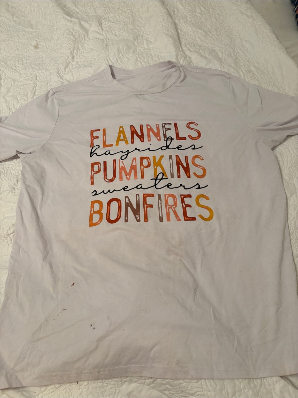 Cozy Fall Graphic Tee — "Flannels Pumpkins Bonfires" — Light Lavender